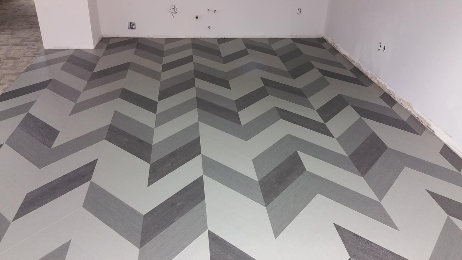 Designer luxury vinyl plank flooring installed in a Burnaby home