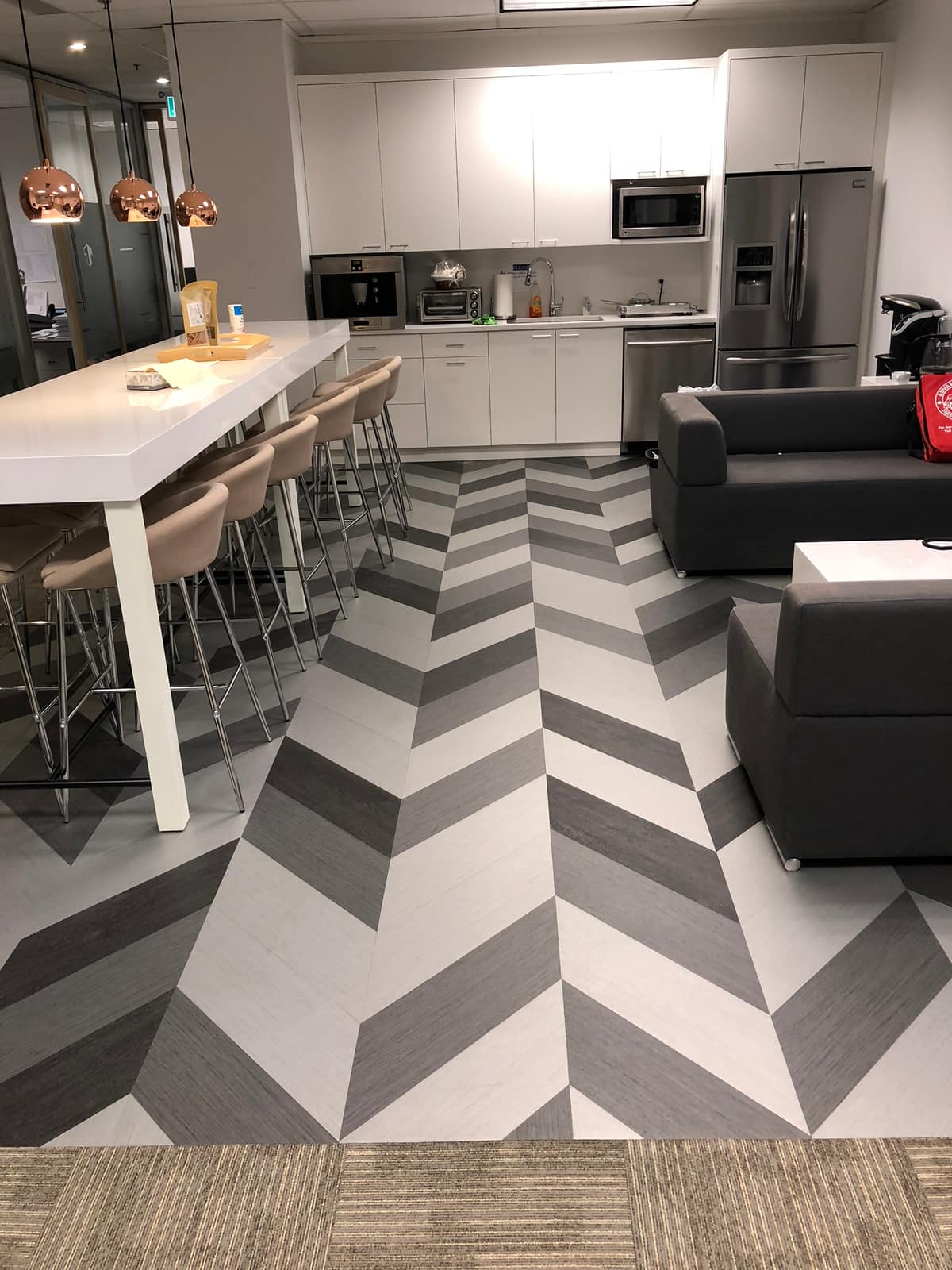 Designer luxury vinyl plank flooring installed in a Burnaby home