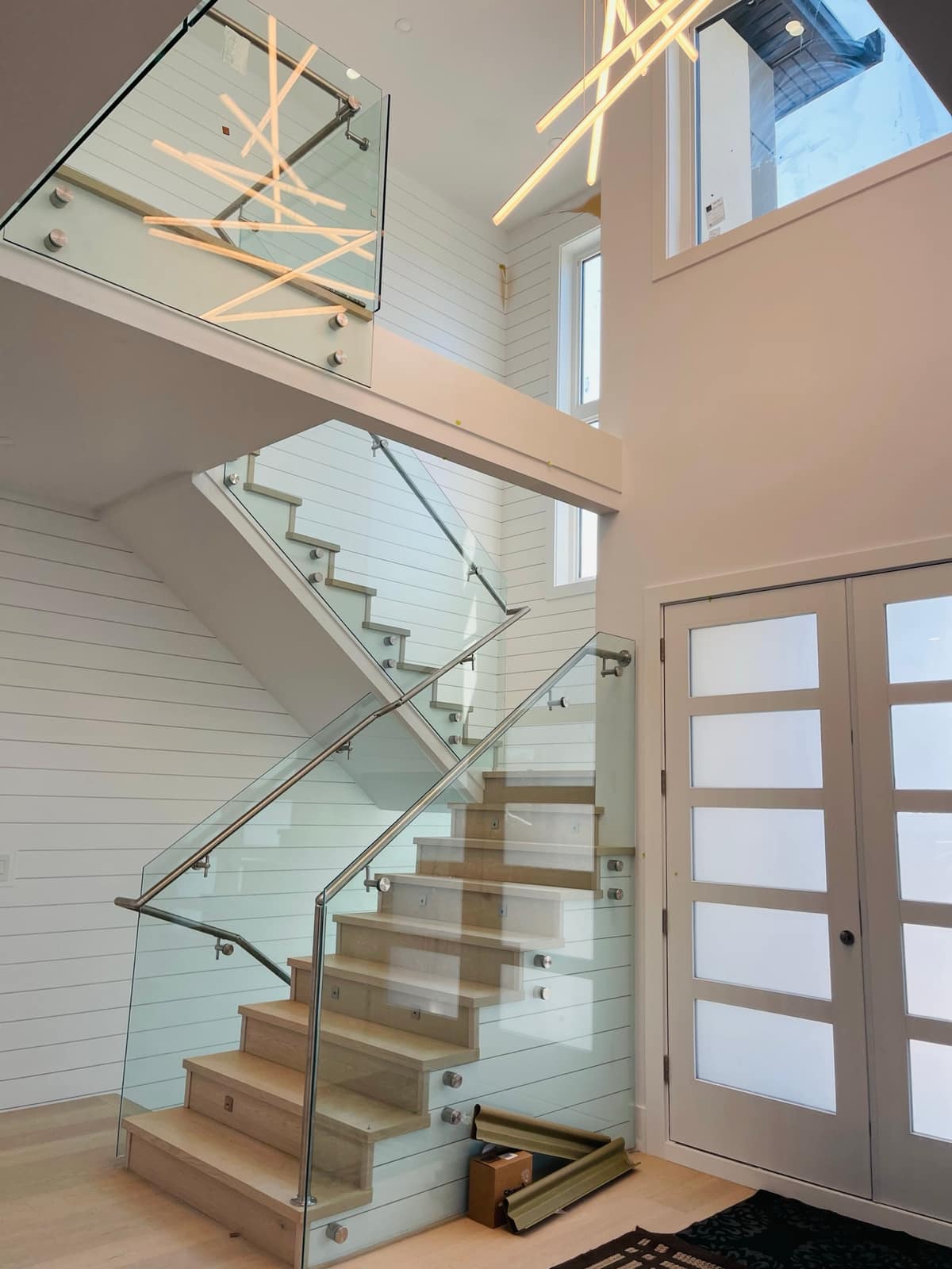 Engineered hardwood stairs installed in a Surrey home