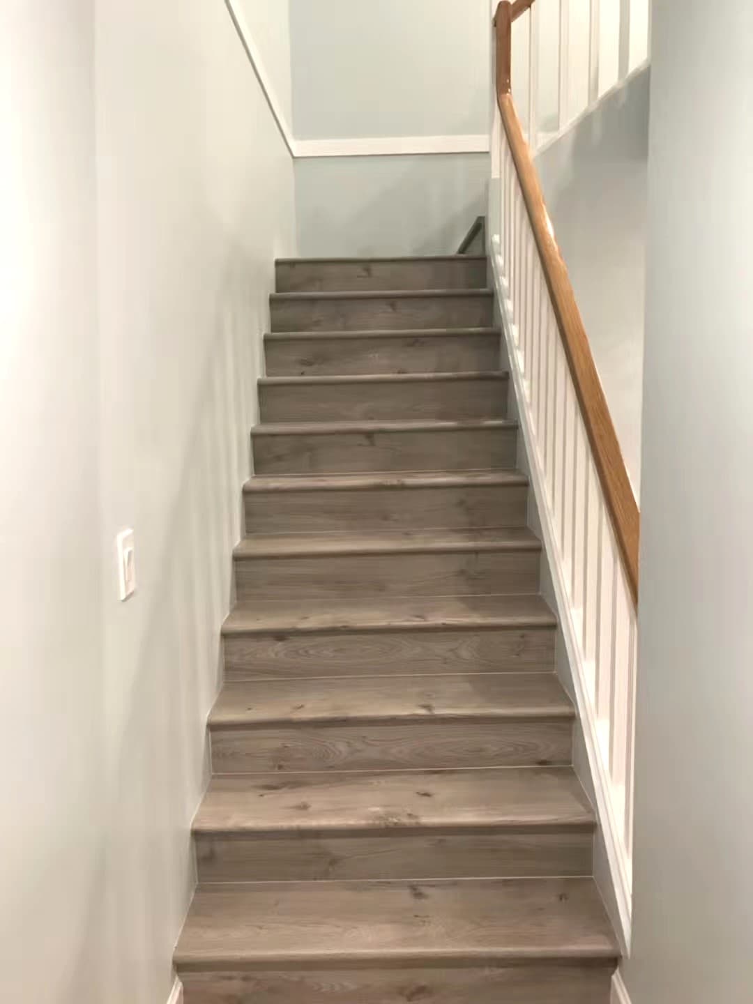 Laminate stairs installed in a Coquitlam house