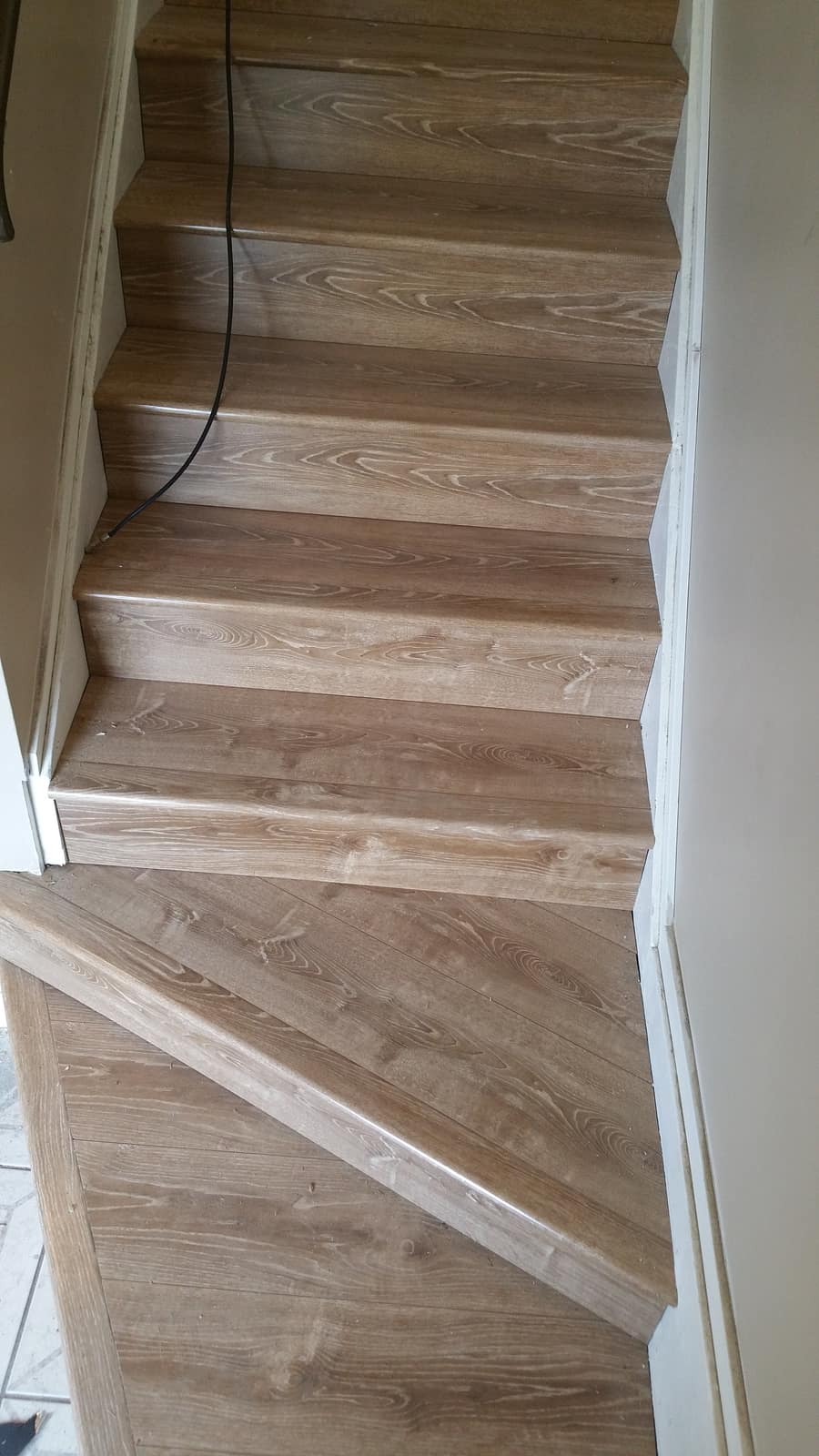 Laminate-clad stairs installed in a Mission, BC home