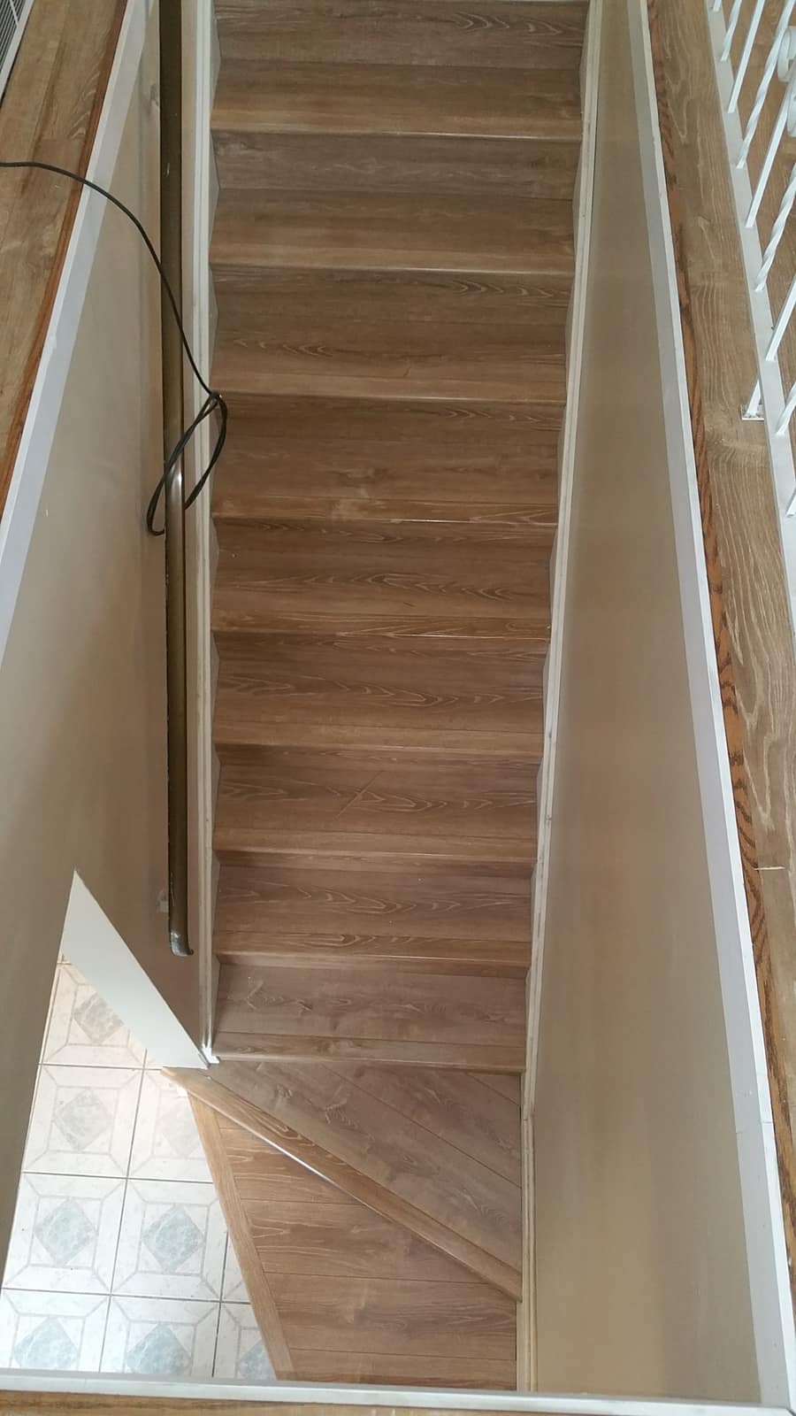Laminate-clad stairs installed in a Mission, BC home