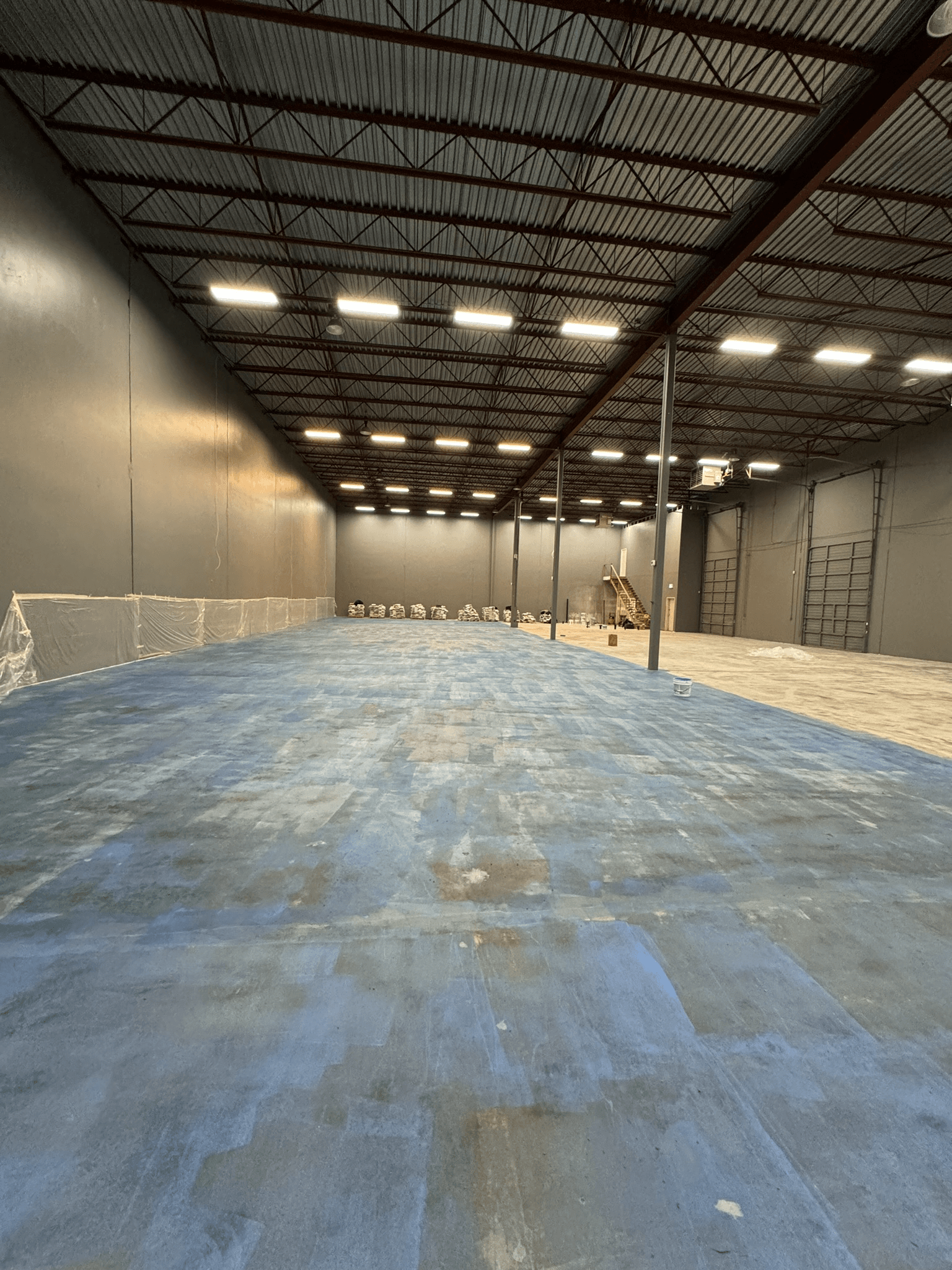 Richmond warehouse floor prepared for self-levelling underlayment
