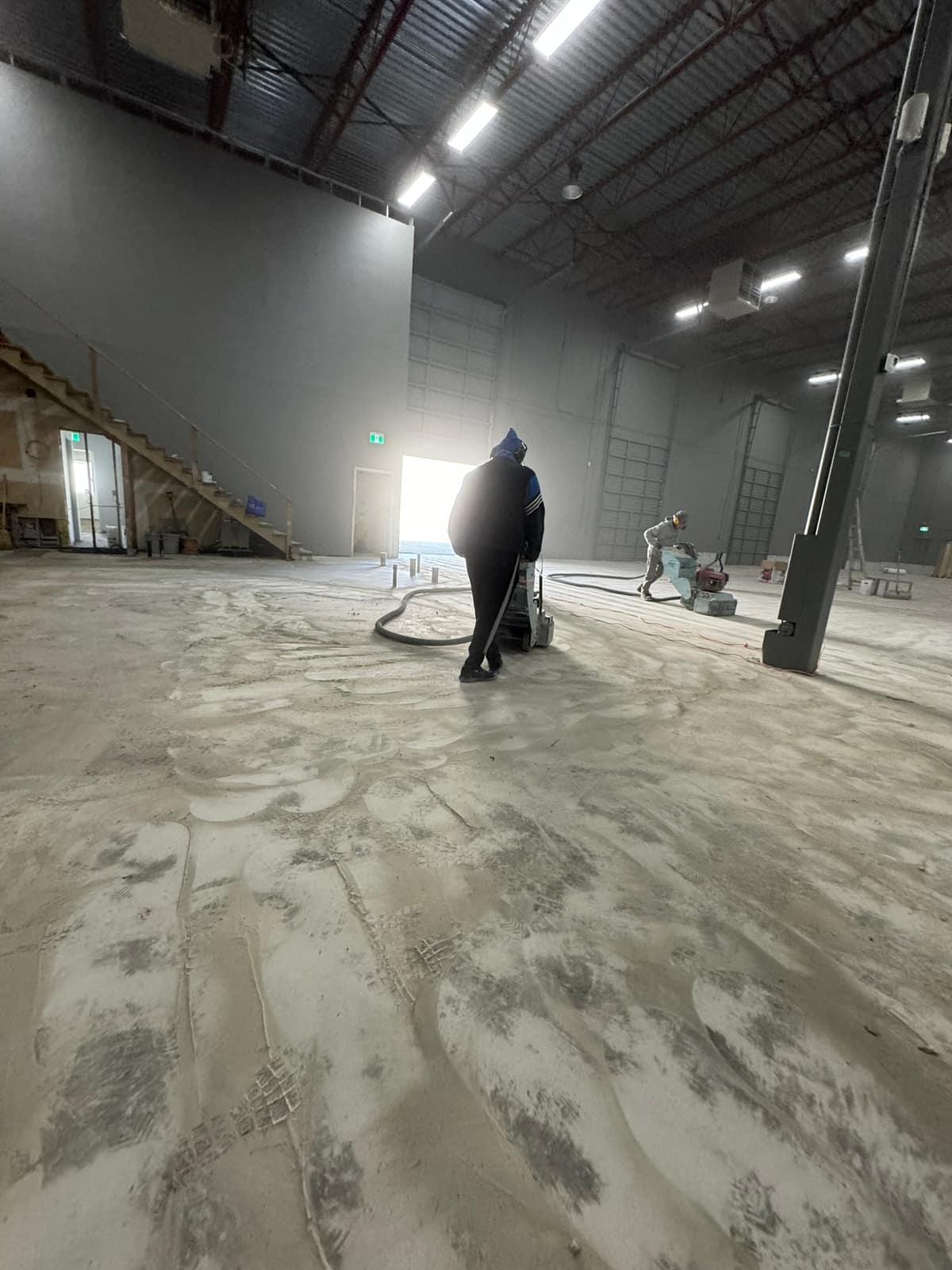 Self-levelling underlayment poured across a Richmond warehouse floor