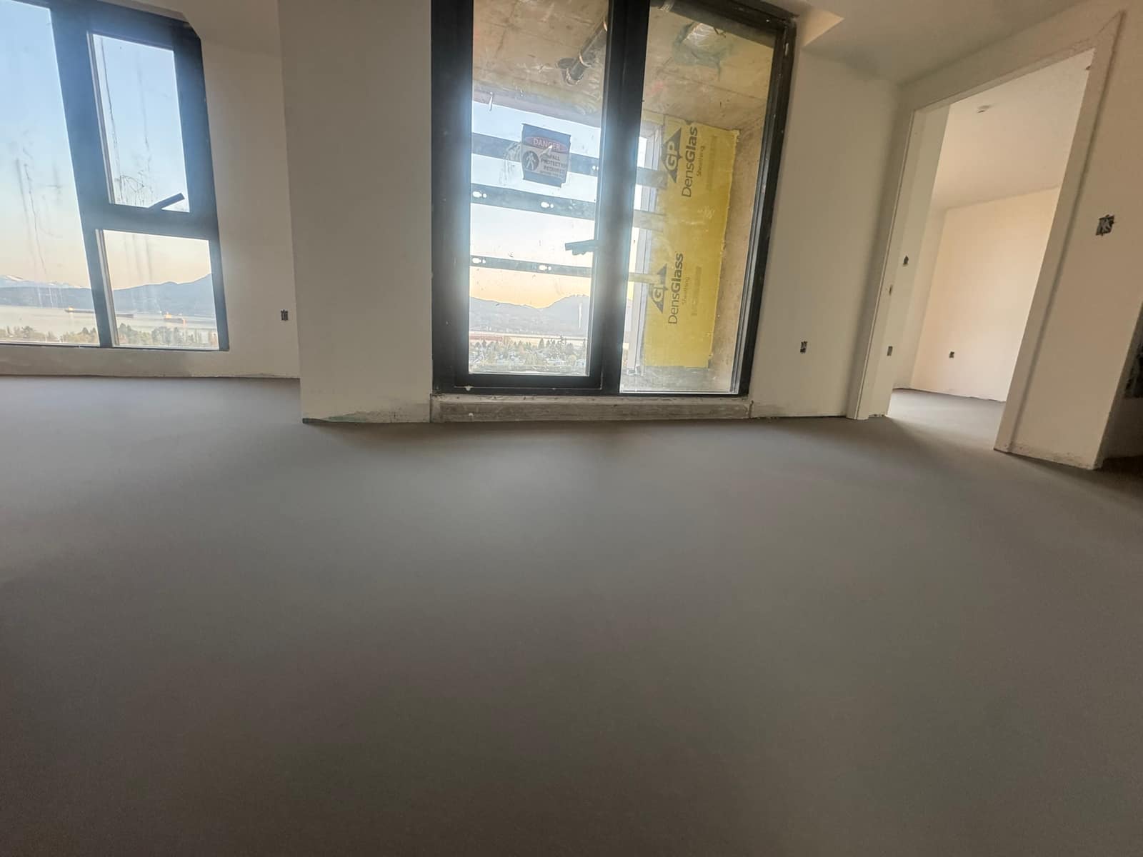 Self-levelling underlayment pour in the Oakridge area of Vancouver