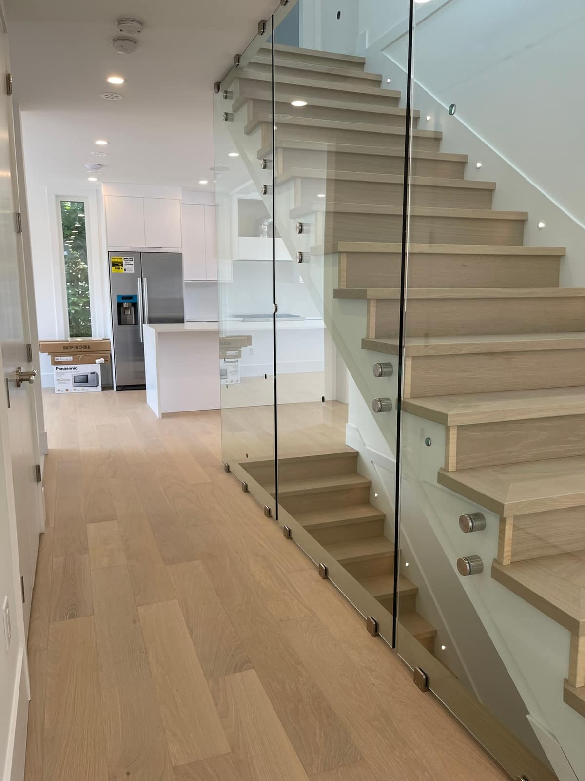 Solid hardwood flooring installed in a New Westminster home