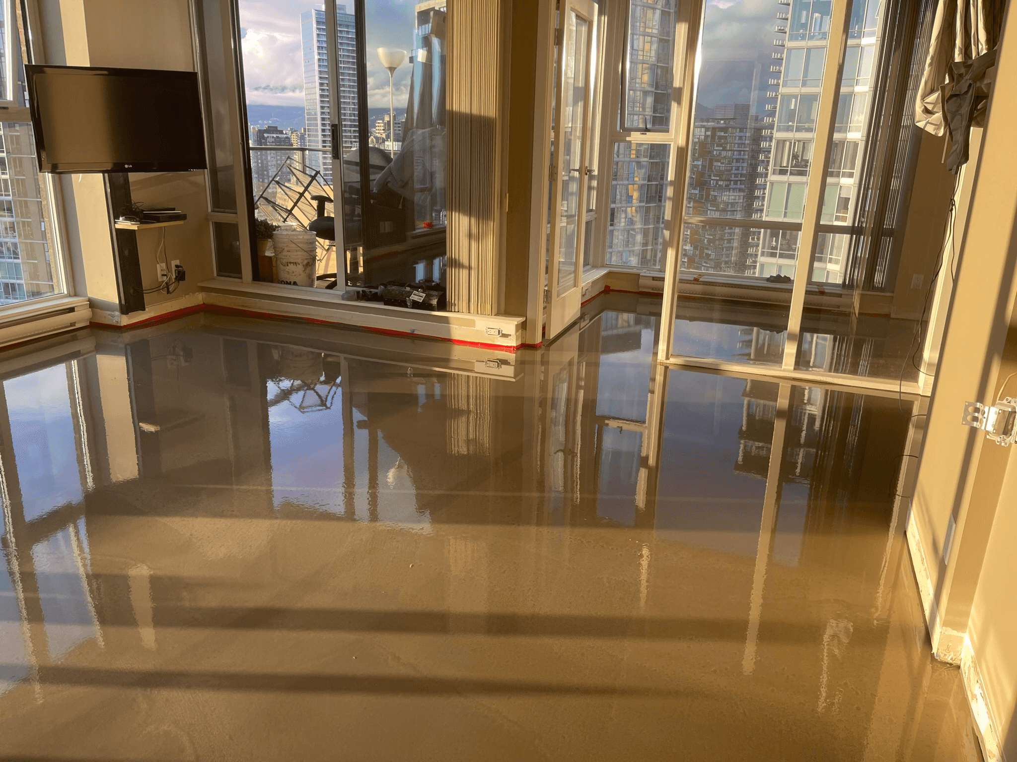 Self-levelling underlayment in a downtown Vancouver condo